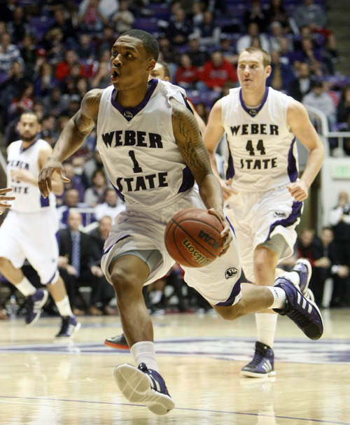 Chris Detrick  |  The Salt Lake Tribune
Weber State Wildcats guard Damian Lillard (1) runs the ball up the court during the second half of the game at the Dee Events Center Thursday December 22, 2011. Weber State defeated Utah 80-51.
