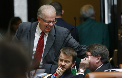 Scott Sommerdorf   |  The Salt Lake Tribune
Rep. Mike Noel, R-Kanab, left, jokes with Rep. Jim Bird, R-West Jordan, right, after Bird's bill, HB271 - Funding for Public Education - failed after a close vote, Thursday, March 7, 2013. Rep. Johnny Anderson, R-Taylorsville, is at center.