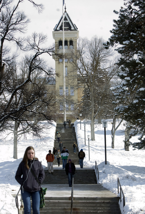 Kim Raff  |  The Salt Lake Tribune
Utah State University students walk out of the Old Main on campus in Logan on February 25, 2013. Utah State University is stepping up recruitment of out-of-state students to make up for lower enrollment numbers after the lowering of the missionary age.