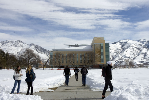 Kim Raff  |  The Salt Lake Tribune
Utah State University students walk to classes on the Quad on campus in Logan on February 25, 2013. Utah State University is stepping up recruitment of out-of-state students to make up for lower enrollment numbers after the lowering of the missionary age.