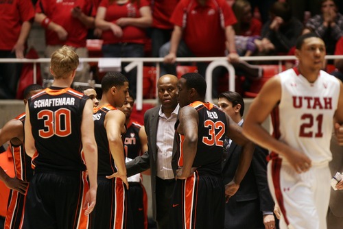 Kim Raff  |  The Salt Lake Tribune
Oregon State head coach Craig Robinson talks with his team during a time out during a game against Utah at the Huntsman Center in Salt Lake City on March 7, 2013. Utah went on to win 72-61.