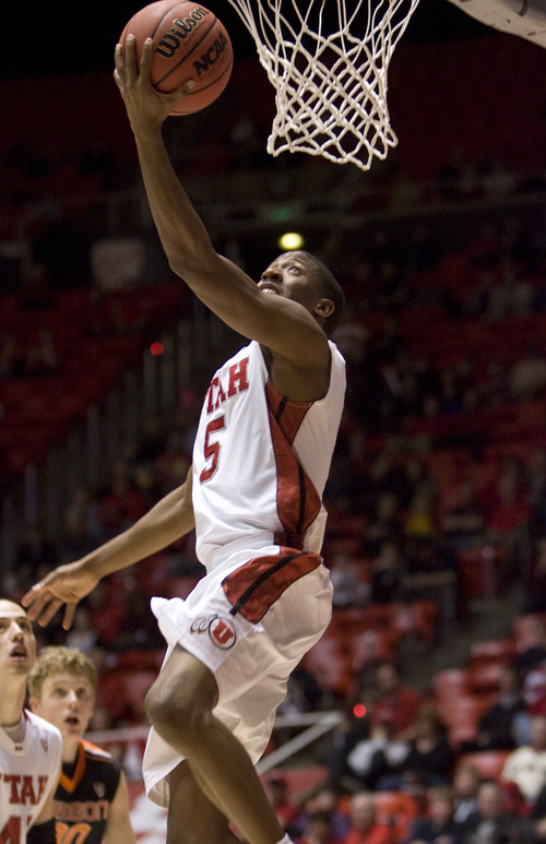 Kim Raff  |  The Salt Lake Tribune
Utah Utes guard Jarred DuBois (5) scores two on a lay up during a game against Oregon State at the Huntsman Center in Salt Lake City on March 7, 2013. Utah went on to win 72-61.