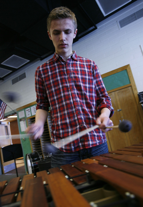 Francisco Kjolseth  |  The Salt Lake Tribune
Laurids Madsen of Denmark, an exchange student at Highland High works on the percussion at school as he practices five hours a day for upcoming performances with the Utah Youth Symphony.