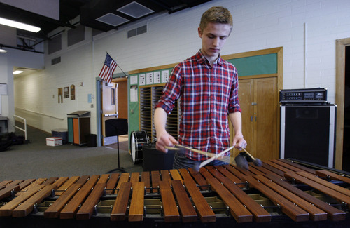 Francisco Kjolseth  |  The Salt Lake Tribune
Laurids Madsen of Denmark, an exchange student at Highland High works on the percussion at school as he practices five hours a day for upcoming performances with the Utah Youth Symphony.