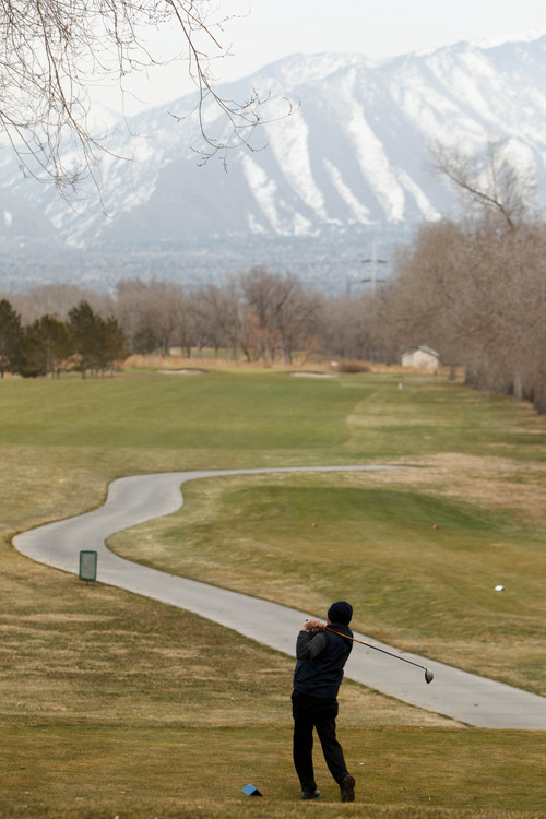 Trent Nelson  |  The Salt Lake Tribune
Golfers brave the chill at the Meadow Brook Golf Course Thursday March 7, 2013 in Salt Lake City