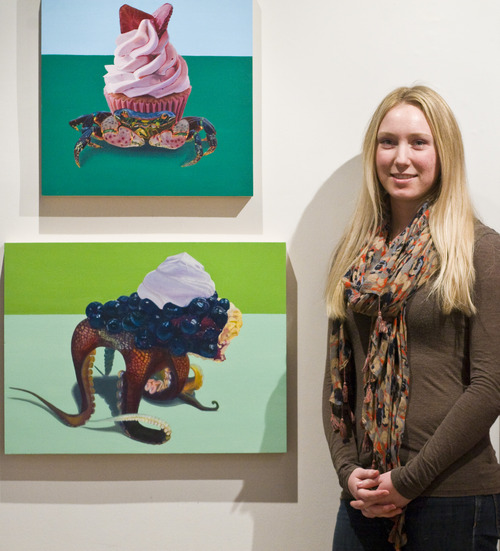 Chris Detrick  |  The Salt Lake Tribune
Tess Cook poses for a potrait with her pieces "Strawberry" and "Blueberry" for the 35 by 35 project in the Finch Lane Gallery at Reservoir Park Wednesday March 6, 2013. 35 Utah artists all 35 or younger will be displaying their works at the Finch Lane Gallery through April 26. The exhibit covers all fields: Video, sculpture, painting, printmaking, ceramics, performance, installation and drawing.