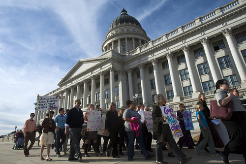 Chris Detrick  |  The Salt Lake Tribune
Members of Mormons Building Bridges sing hymns during a rally at the Utah State Capitol Tuesday March 12, 2013. Mormons Building Bridges is a faith-based family event for members of the Church of Jesus Christ of Latter-Day Saints to show their Mormon values of pure, unconditional love and inclusion.