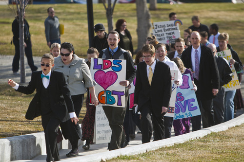 Chris Detrick  |  The Salt Lake Tribune
Members of Mormons Building Bridges sing hymns during a rally at the Utah State Capitol Tuesday March 12, 2013. Mormons Building Bridges is a faith-based family event for members of the Church of Jesus Christ of Latter-Day Saints to show their Mormon values of pure, unconditional love and inclusion.