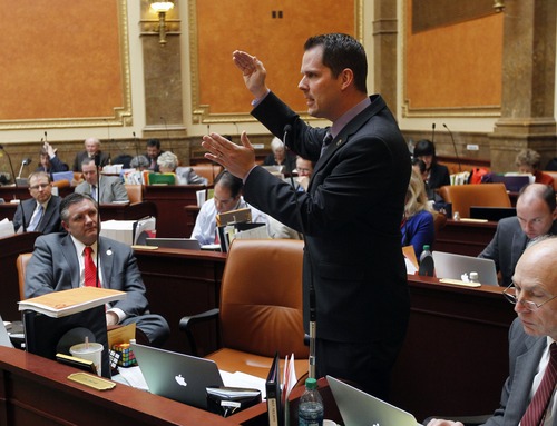 Al Hartmann  |  The Salt Lake Tribune
Rep. Jacob Anderegg, R-Lehi, sponsor of HB391S2, Prohibition of Medicaid Expansion speaks for the bill's passage in the Utah House of Representatives Monday March 11.