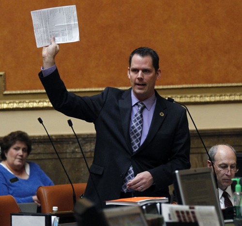 Al Hartmann  |  The Salt Lake Tribune
Rep. Jacob Anderegg, R-Lehi, sponsor of HB391S2, Prohibition of Medicaid Expansion speaks for the bill's passage in the Utah House of Representatives Monday March 11.