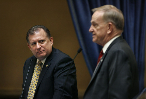 Scott Sommerdorf   |  The Salt Lake Tribune
Sen. Curt Bramble, R-Provo, left, listens as Sen. Allen Christensen, R-North Ogden, answers his question about HB76 - Concealed Weapon Carry Amendments - in the Utah Senate, Wednesday, March 13, 2013.   After a "Call of the Senate" to ensure the maximum number of votes on the bill, it passed with 21 votes for, 4 against.