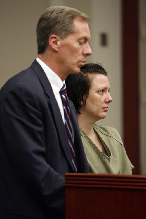 Francisco Kjolseth  |  The Salt Lake Tribune
Sandra Chotia-Thompson appears at the Matheson Courthouse in Thursday, alongside defense attorney Michael Peterson. Chotia-Thompson waived her preliminary hearing in connection with an alleged armed robbery at a Salt Lake City grocery store.