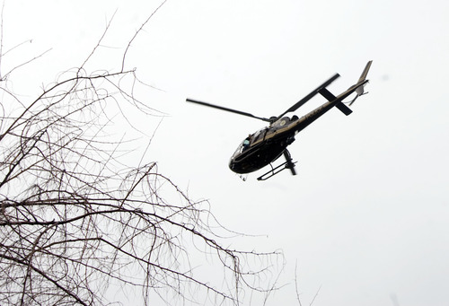 Kim Raff  |  The Salt Lake Tribune
Helicopters aid in an intensive search for Benjamin Thomas Hyde along the Jordan River in South Salt Lake on March 15, 2013. Hyde, who has mentally and physically disabled, has been missing since Wednesday evening.
