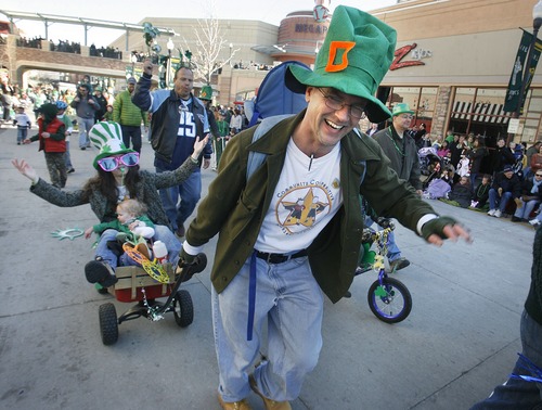 Calvin Jolley pulls his cargo in the Community Co-op Nursery School entry in the 2009  Salt Lake City St. Patrtick's Day Parade. The 2013 version is Saturday in the Gateway. 
Scott Sommerdorf/The Salt Lake Tribune