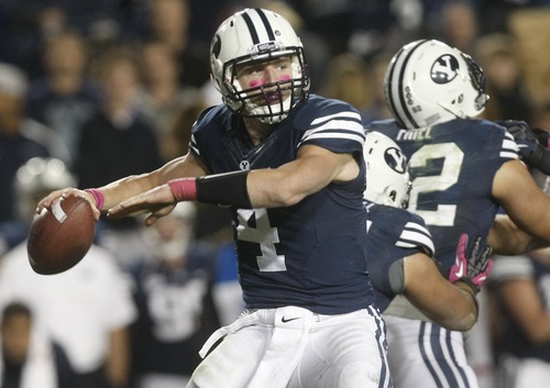 Chris Detrick  |  The Salt Lake Tribune
Though the coaching staff won't publicly acknowledge it, sophomore Taysom Hill (4) has taken charge in the BYU quarterback race during spring practice.
