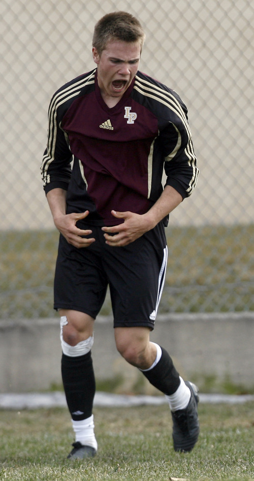 Rick Egan  | The Salt Lake Tribune 

Michael Smith reacts after missing goal for Lone Peak,in prep soccer action Lone Peak vs. West, at West High, Monday, March 11, 2013.