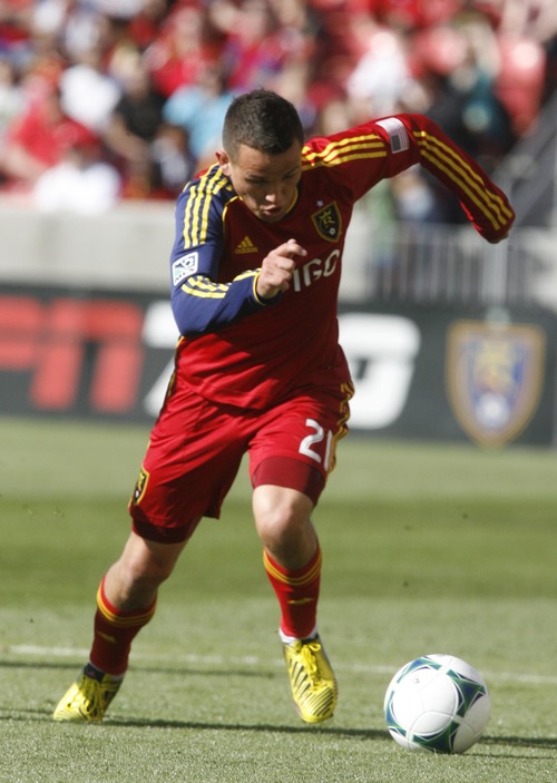 Rick Egan  | The Salt Lake Tribune 

Real Salt Lake midfielder Luis Gil (21) goes after the ball, in MLS soccer action, at RIo Tinto Stadium, Saturday, March 16, 2013.