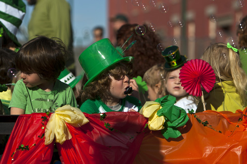 Chris Detrick  |  The Salt Lake Tribune
Children from the Community Cooperative Nursery School during the Salt Lake City St. Patrick's Day parade Saturday March 16, 2013. The annual parade showcasing Utah's Irish heritage, which celebrates its 35th year today, claims its roots in the first Irish immigrants brought to the state by Park City's mining boom, and even Irish-American soldiers stationed at Fort Douglas as early as 1862.