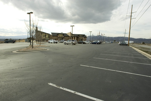 Paul Fraughton  |   Salt Lake Tribune
A nearly empty parking lot at the Cedar Hills Golf Club  in Cedar Hills on a Tuesday afternoon.
 Tuesday, March 12, 2013