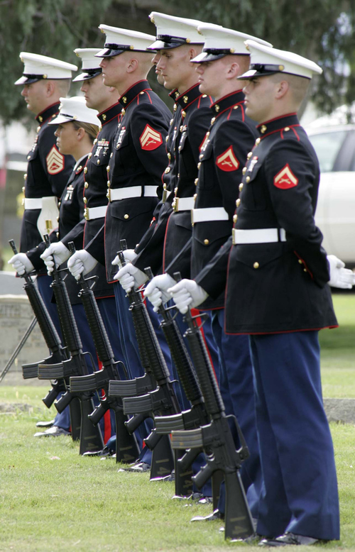 Trent Nelson | The Salt Lake Tribune

A Marine honor guard stands at attention in the Spanish Fork City Cemetery, September 22, 2004 during the funeral of Cesar Machado-Olmos, a marine who was killed in Iraq.
