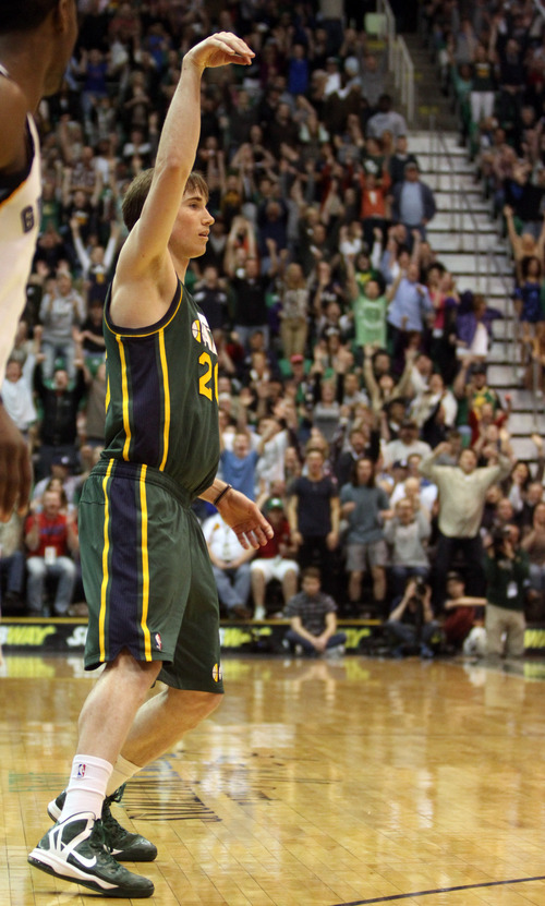 Rick Egan  | The Salt Lake Tribune 

Utah Jazz shooting guard Gordon Hayward (20) sinks a 3-pointer, giving the Jazz a 6 point lead with 17.3 seconds left in the game,  in NBA action, The Utah Jazz vs. The Memphis Grizzlies at EnergySolutions Arena, Saturday, March 16, 2013.