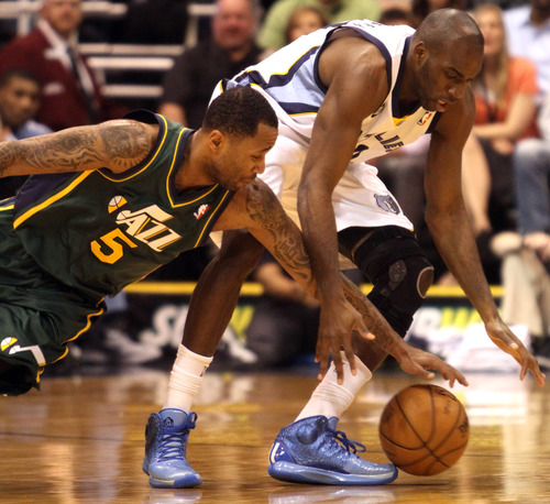 Rick Egan  | The Salt Lake Tribune 

Utah Jazz point guard Mo Williams (5) steals the ball from Memphis Grizzlies small forward Quincy Pondexter (20) in NBA action, The Utah Jazz vs. The Memphis Grizzlies at EnergySolutions Arena, Saturday, March 16, 2013.