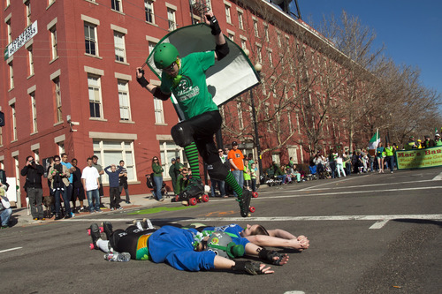 Chris Detrick  |  The Salt Lake Tribune
Members of the Wasatch Roller Derby participate in the Salt Lake City St. Patrick's Day parade Saturday March 16, 2013. The annual parade showcasing Utah's Irish heritage, which celebrates its 35th year today, claims its roots in the first Irish immigrants brought to the state by Park City's mining boom, and even Irish-American soldiers stationed at Fort Douglas as early as 1862.