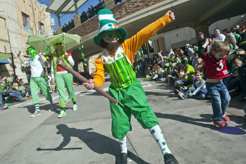 ]Chris Detrick  |  The Salt Lake Tribune
Max Donavan, 7, of Logan, dances with Shillelaghs Shenanigans during the Salt Lake City St. Patrick's Day parade Saturday March 16, 2013. The annual parade showcasing Utah's Irish heritage, which celebrates its 35th year today, claims its roots in the first Irish immigrants brought to the state by Park City's mining boom, and even Irish-American soldiers stationed at Fort Douglas as early as 1862.