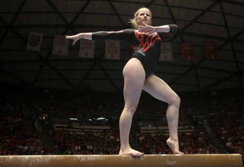 Kim Raff  |  The Salt Lake Tribune
Utah gymnast Tory Wilson performs her routine on the beam during a meet against Florida at the Huntsman Center in Salt Lake City on March 16, 2013. Utah went on to beat Florida in the meet.