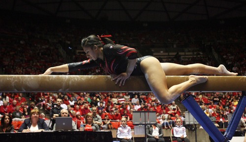 Kim Raff  |  The Salt Lake Tribune
Utah gymnast Kassandra Lopez performs her routine on the beam during a meet against Florida at the Huntsman Center in Salt Lake City on March 16, 2013. Utah went on to beat Florida in the meet.