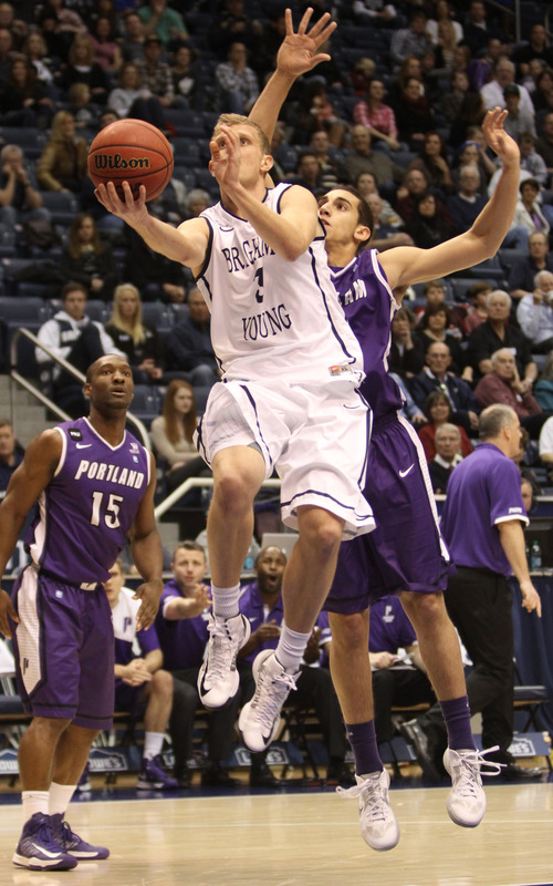 Rick Egan  | The Salt Lake Tribune 

Brigham Young Cougars guard Tyler Haws (3) takes the ball to the hoop, in basketball action, as the BYU Coiugars played the Portland Pilots, at the Marriott Center, Saturday, February 16, 2013.