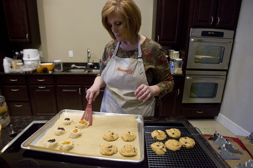 Kim Raff  |  The Salt Lake Tribune
Lisa Barker, the outreach and education coordinator for Honeyville Grains, makes cookies using almond flour at the company's Salt Lake City store.