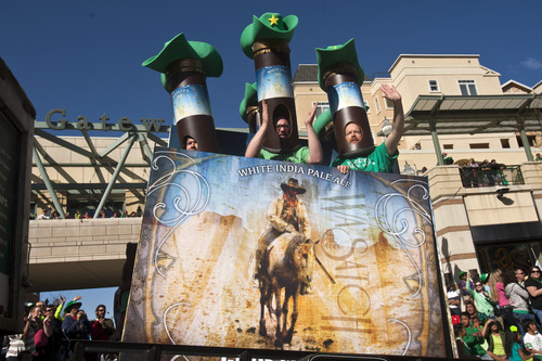 Chris Detrick  |  The Salt Lake Tribune
Bottles of Wasatch's Ghost Rider beer during the Salt Lake City St. Patrick's Day parade Saturday March 16, 2013. The annual parade showcasing Utah's Irish heritage, which celebrates its 35th year today, claims its roots in the first Irish immigrants brought to the state by Park City's mining boom, and even Irish-American soldiers stationed at Fort Douglas as early as 1862.