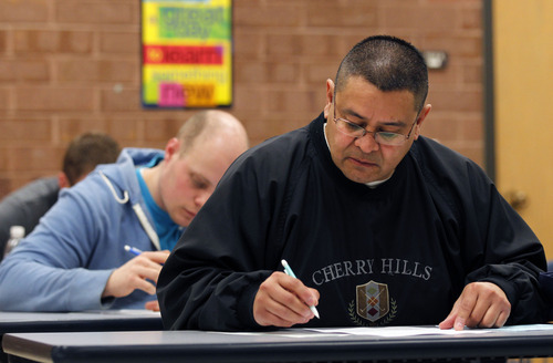 Al Hartmann  |  The Salt Lake Tribune
Criminal Justice major and Iraq war veteran Gilbert Prado takes a test in a homeland security class at Salt Lake Community College's Redwood Campus.