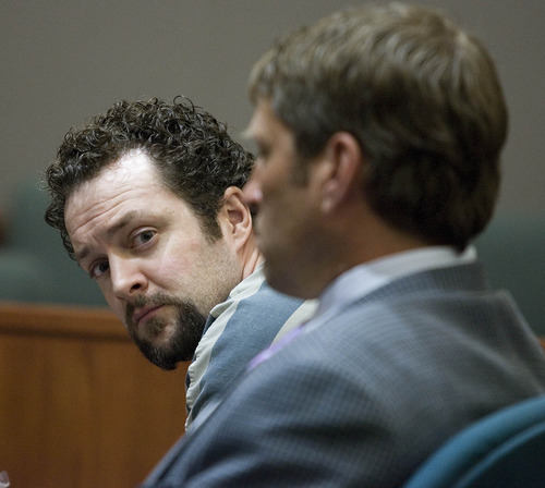 Paul Fraughton  |  The Salt Lake Tribune
Nathan Sloop sits next to his defense attorney Scott Williams in  the courtroom of Judge Glen Dawson in Farmington for an evidentiary hearing prior to his upcoming preliminary hearing.
 Monday, March 18, 2013