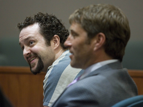 Paul Fraughton  |  The Salt Lake Tribune
Nathan Sloop sits next to his defense attorney Scott Williams in  the courtroom of Judge Glen Dawson in Farmington for an evidentiary hearing prior to his upcoming preliminary hearing.
 Monday, March 18, 2013