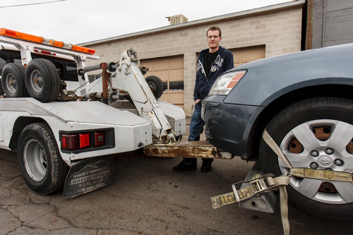Trent Nelson  |  The Salt Lake Tribune
Repo man Nolan Edwards with a car he has recently repossessed Friday, March 1, 2013 in Salt Lake City.