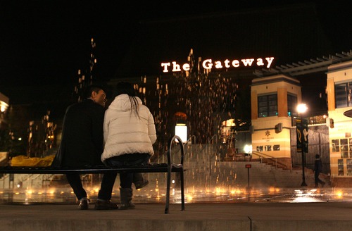 Leah Hogsten  |  The Salt Lake Tribune
A couple enjoys the Olympic fountains at The Gateway Tuesday, March 12, 2013. The Gateway mall is starting a $2 million renovation project to attract new tenants.