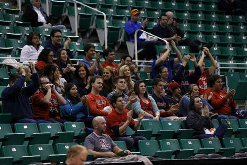 Chris Detrick  |  The Salt Lake Tribune
Arizona Wildcats fans cheer during a practice at EnergySolutions Arena Wednesday March 20, 2013.