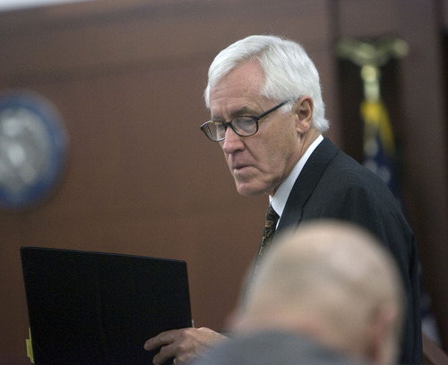 Al Hartmann  |  Tribune file photo 
Lawyer Alan Sullivan of  Snell & Wilmer and working with the Rocky Mountain Innocence Center argues on behalf of Debra Brown at her factual innocence hearing on Jan. 18, 2011. The Innocence Center may have found DNA evidence that exonerates Wyoming inmate Andrew Johnson of a 1989 rape.