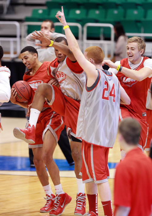 Scott Sommerdorf   |  The Salt Lake Tribune
The New Mexico Lobos celebrate Chad Adams' shot from half-court during practice at Energy Solutions Arena, Wednesday, March 20, 2013. Adams, second from left, hit the shot and the team went nuts.
