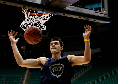 Trent Nelson  |  The Salt Lake Tribune
Pittsburgh's Steven Adams dunks the ball as the Pittsburgh Panthers practice the day before their second round matchup with Wichita State in the NCAA Men's Basketball tournament, Wednesday March 20, 2013 in Salt Lake City.