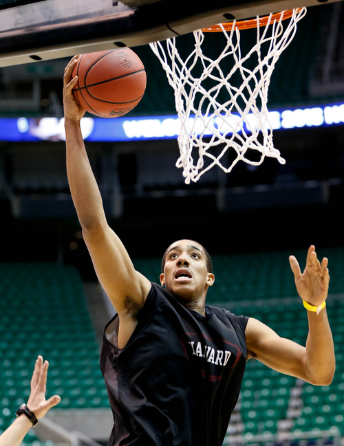 Trent Nelson  |  The Salt Lake Tribune
Harvard's Kenyatta Smith (25) shoots the ball as Harvard practices the day before their second round matchup with New Mexico in the NCAA Men's Basketball tournament, Wednesday March 20, 2013 in Salt Lake City.