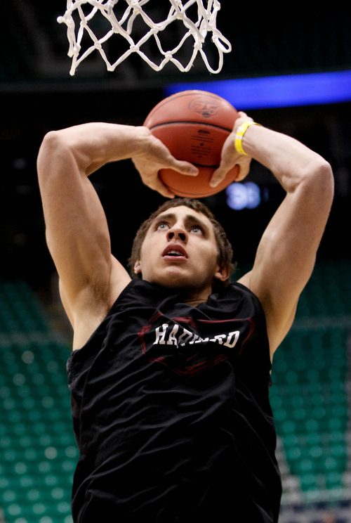 Trent Nelson  |  The Salt Lake Tribune
Harvard's Jonah Travis (24) shoots the ball as Harvard practices the day before their second round matchup with New Mexico in the NCAA Men's Basketball tournament, Wednesday March 20, 2013 in Salt Lake City.