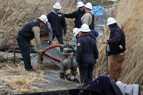 Francisco Kjolseth  |  The Salt Lake Tribune
Crews continue their work to repair a Chevron pipeline leak between Willard Bay North Marina and Interstate 15, on Wednesday, March 20, 2013. The leak which was detected on Monday was on a pipe built in the 1950s that runs up to Idaho.