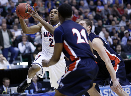 Chris Detrick  |  The Salt Lake Tribune

Arizona Wildcats guard Mark Lyons (2) shoots past the Belmont defense as the Wildcats face the Bruins in the NCAA tournament at EnergySolutions Arena on Thursday, March 21, 2013.