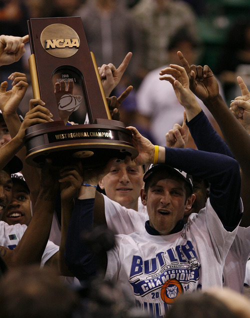 Scott Sommerdorf | The Salt Lake Tribune

Butler celebrates with their trophy after they beat Kansas State during the West Regional of the NCAA Tournament at EnergySolutions Arena, Saturday, March 27, 2010.