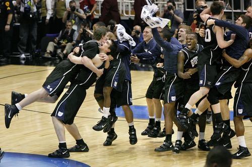 Scott Sommerdorf  |  Salt Lake Tribune
KANSAS STATE BUTLER
The Butler Bulldogs explode form the bench at the end of the game after they beat Kansas State 63-56 to win the West regional final and go to the final four, Friday 3/27/10. At left Butler forward Matt Howard (54) jumps into the arms of Butler center Andrew Smith (44) as the rest of the bench erupts.