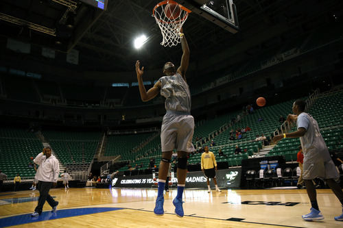 Chris Detrick  |  The Salt Lake Tribune
Southern University Jaguars center Brandon Moore (32) dunks the ball during a practice at EnergySolutions Arena Wednesday March 20, 2013.
