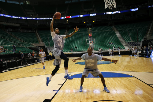 Chris Detrick  |  The Salt Lake Tribune
Southern University Jaguars guard Derick Beltran (2) goes up for a dunk during a practice at EnergySolutions Arena Wednesday March 20, 2013.